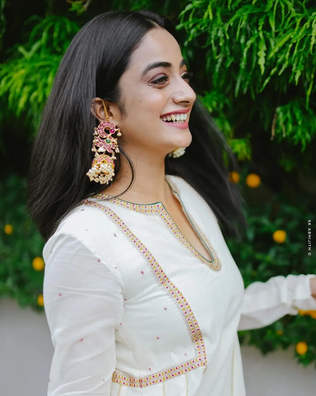 Namitha Pramod Wearing Beautiful Earring Jewellery White Dress